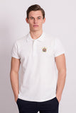 POLO CON DETALLE ESCUDO BORDADO