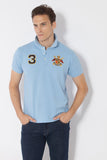 POLO CON ESCUDO BORDADO