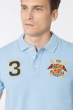 POLO CON ESCUDO BORDADO