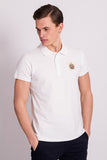 POLO CON DETALLE ESCUDO BORDADO